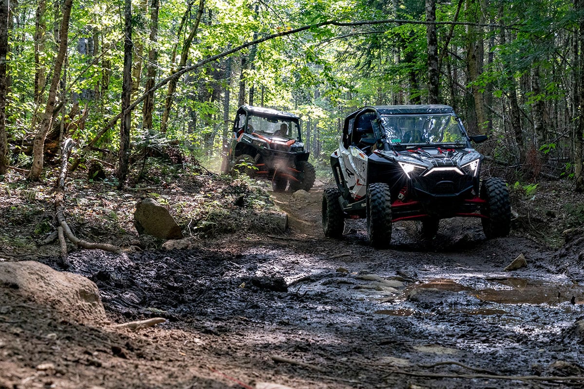Riding UTVs on a designated trail