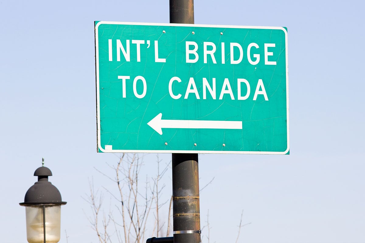 Sign directing motorists to one of Maine's border crossings into Canada