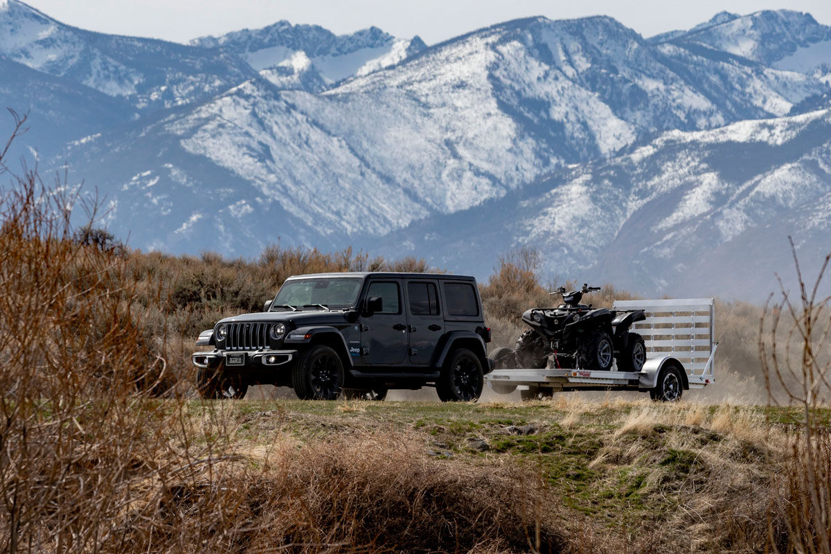 ALCOM-MT-ATV-UTV-trailers-Jeep-with-trailer-and-ATV-mountains-background