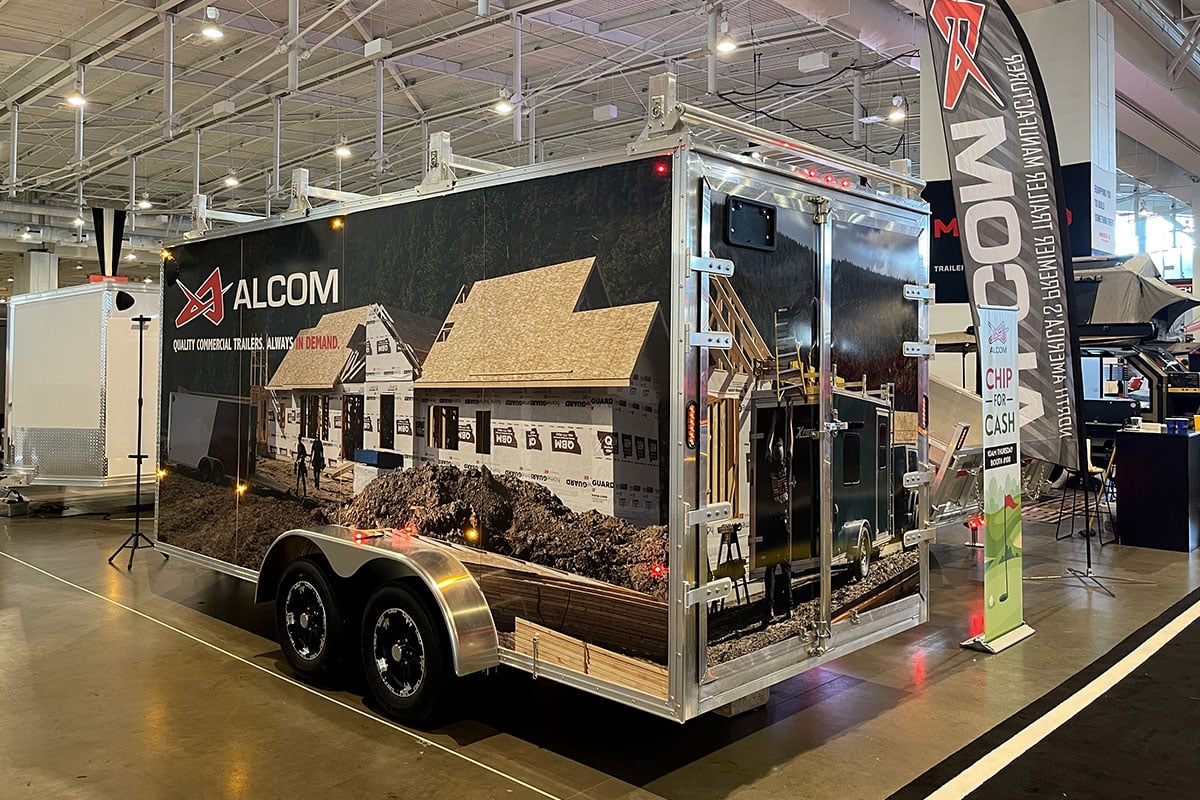 Inside the 2022 NATDA Trailer Show with an ALCOM contractor trailer.
