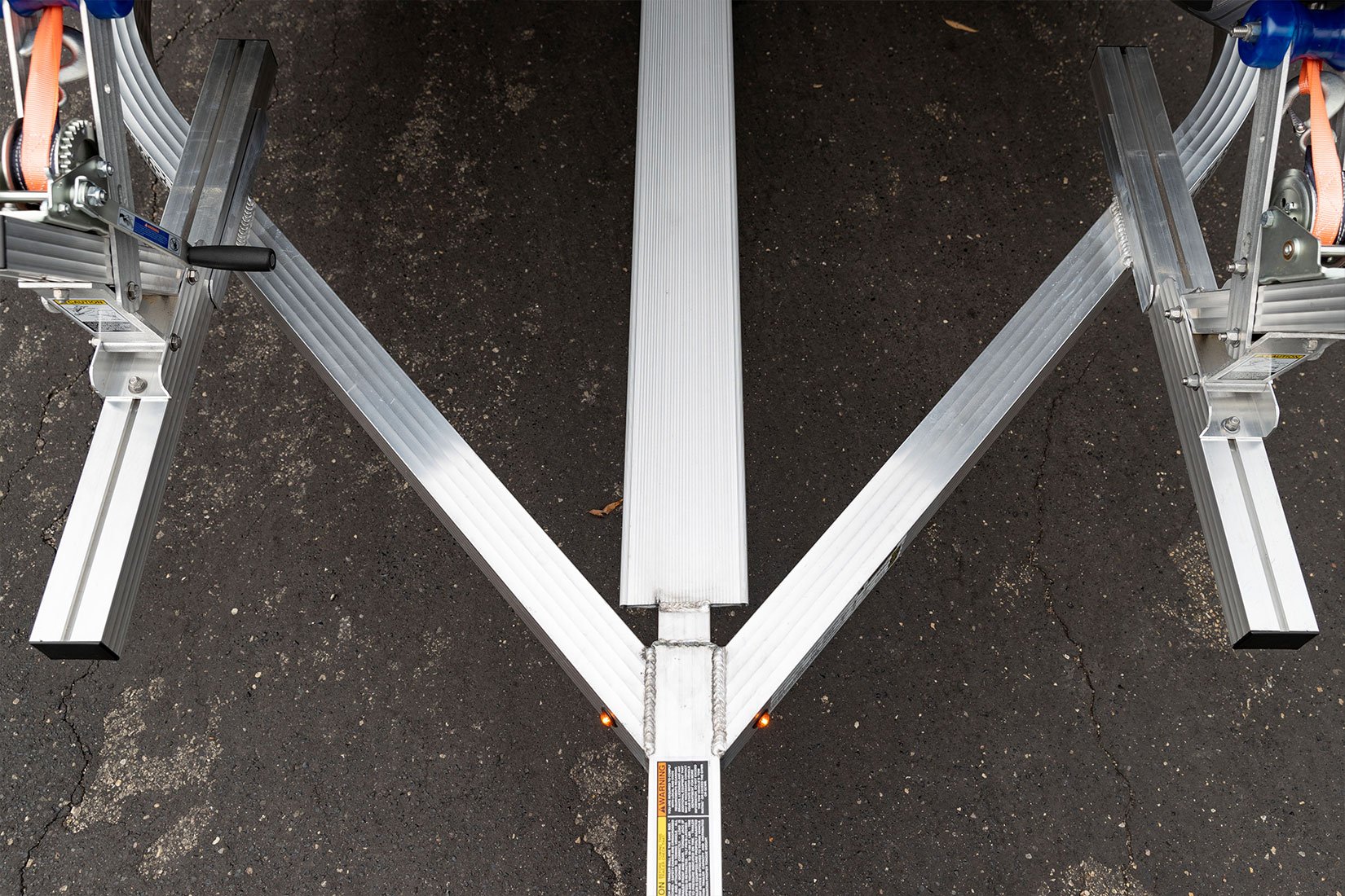 Easily access PWCs with the walk plank on ALCOM's aluminum watercraft trailers from Triton