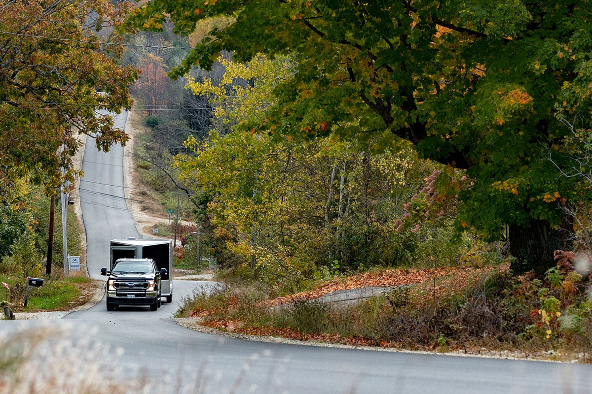 An ALCOM UTV trailer on the road in New England