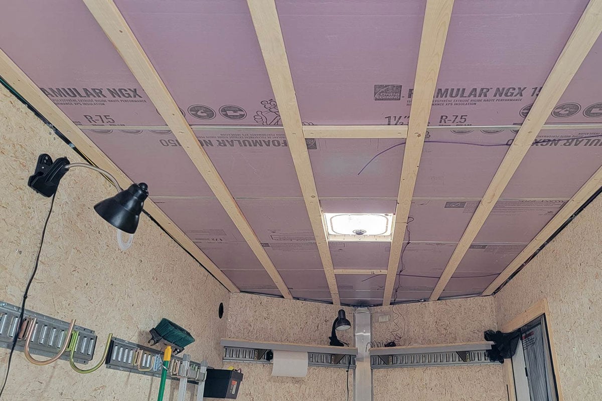 Insulated ceiling and other interior customizations in progress in Ted's ALCOM UTV camping trailer