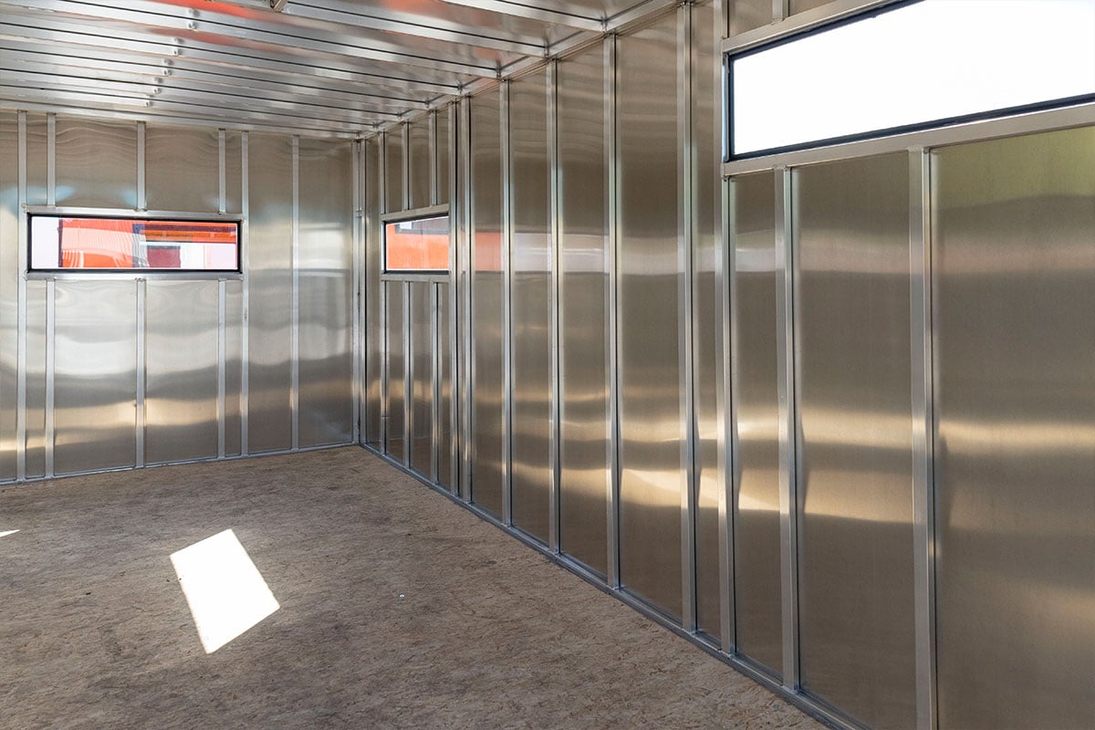 interior of an uninsulated, larger size ALCOM aluminum ice shack