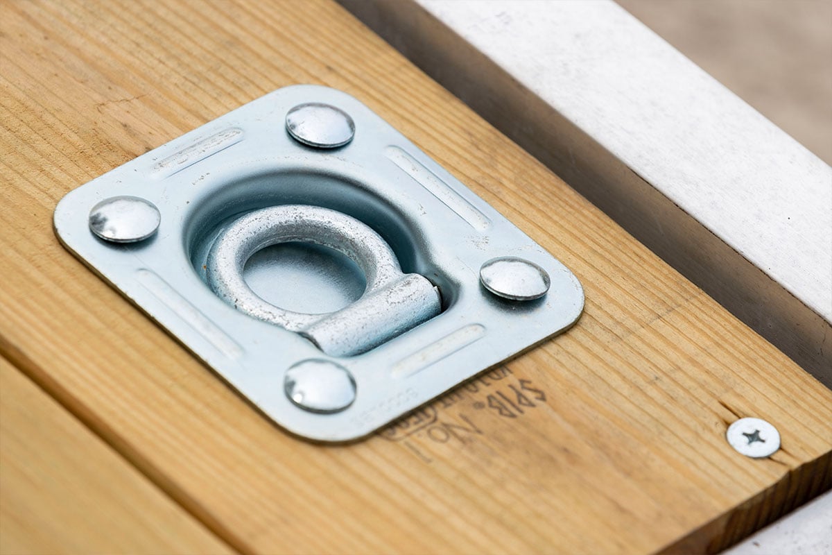 Recessed D-ring on a wood deck ALCOM aluminum car hauler