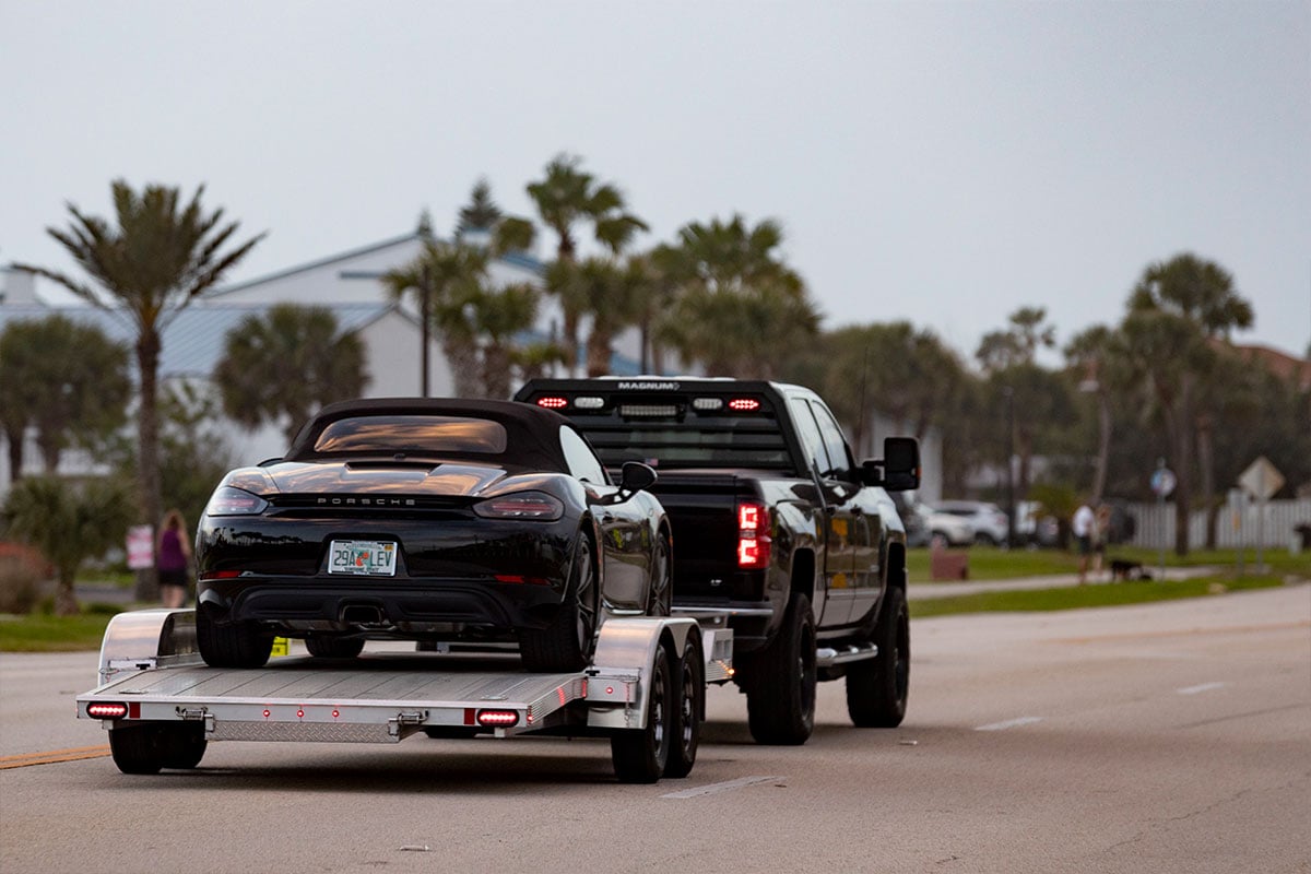 Aluminum car hauler trailer from ALCOM on the road in Florida