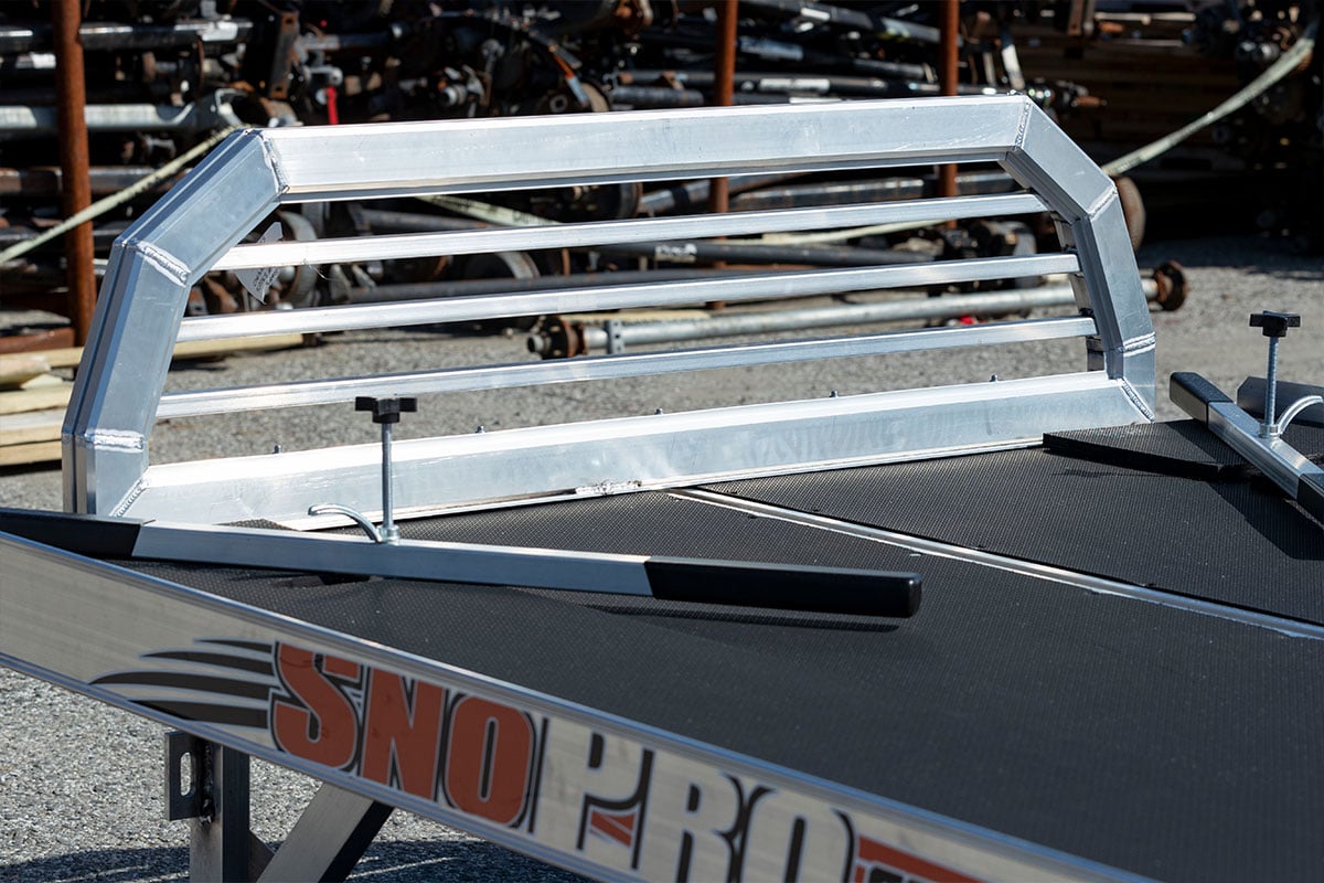 SnoPro by ALCOM: sport deck with two ski tie-down bars and an aluminum headache rack