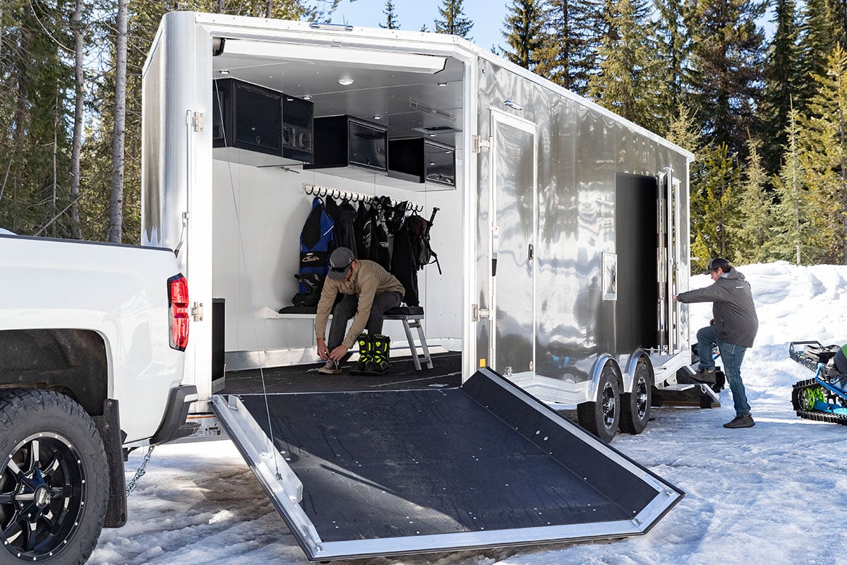 Front spring assisted ramp door on an enclosed inline aluminum snowmobile trailer from ALCOM