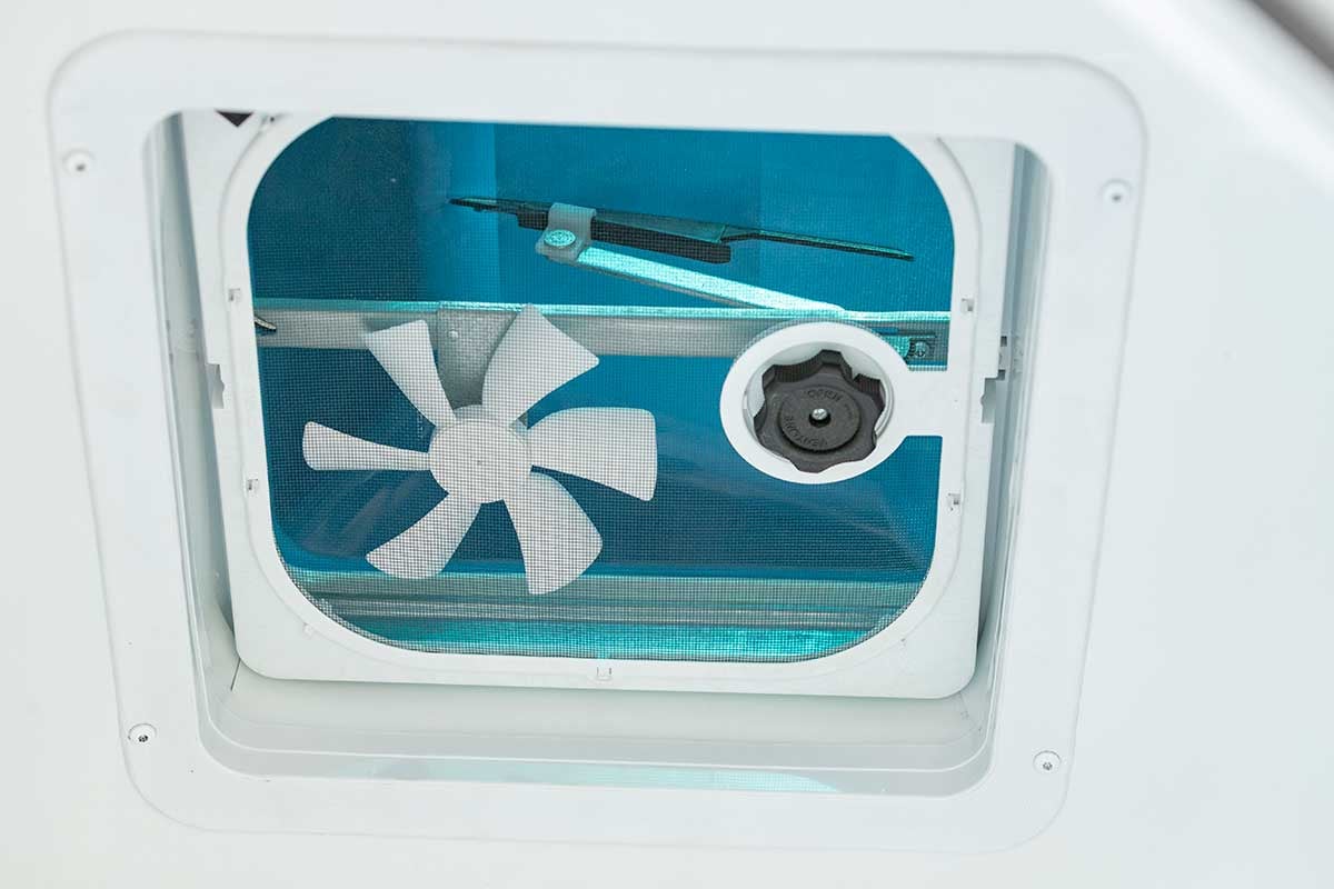 12V powered roof vent installed in the trailer's ceiling; ceiling liner option also shown 