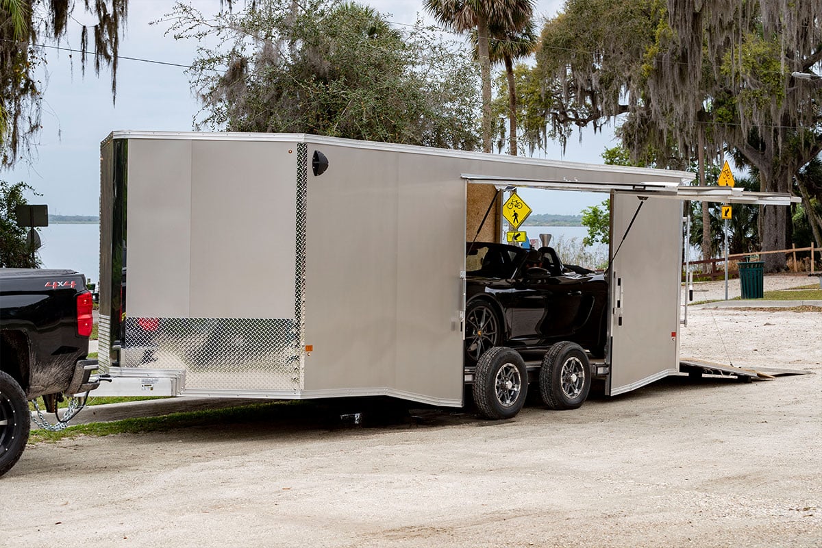 Enclosed car trailer by ALCOM - elite escape door open 