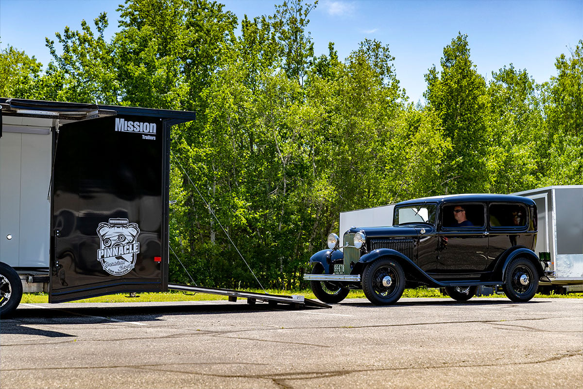 Loading a classic car into an ALCOM Pinnacle enclosed car trailer