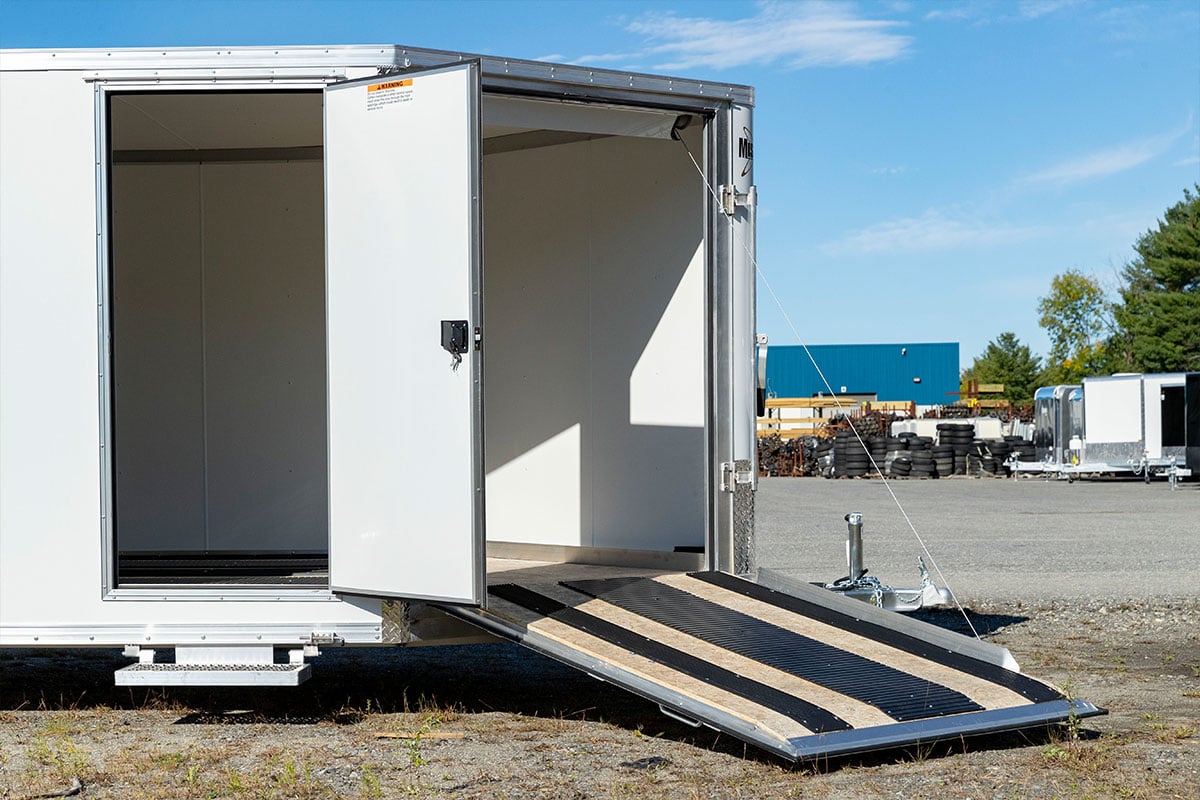 Side access and front ramp doors on an enclosed ALCOM cargo trailer