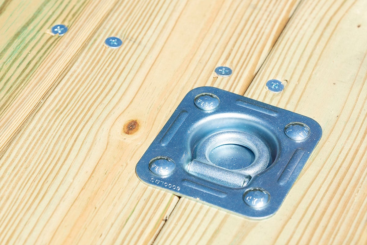 Recessed D-ring installed in wood deck of ALCOM aluminum trailer