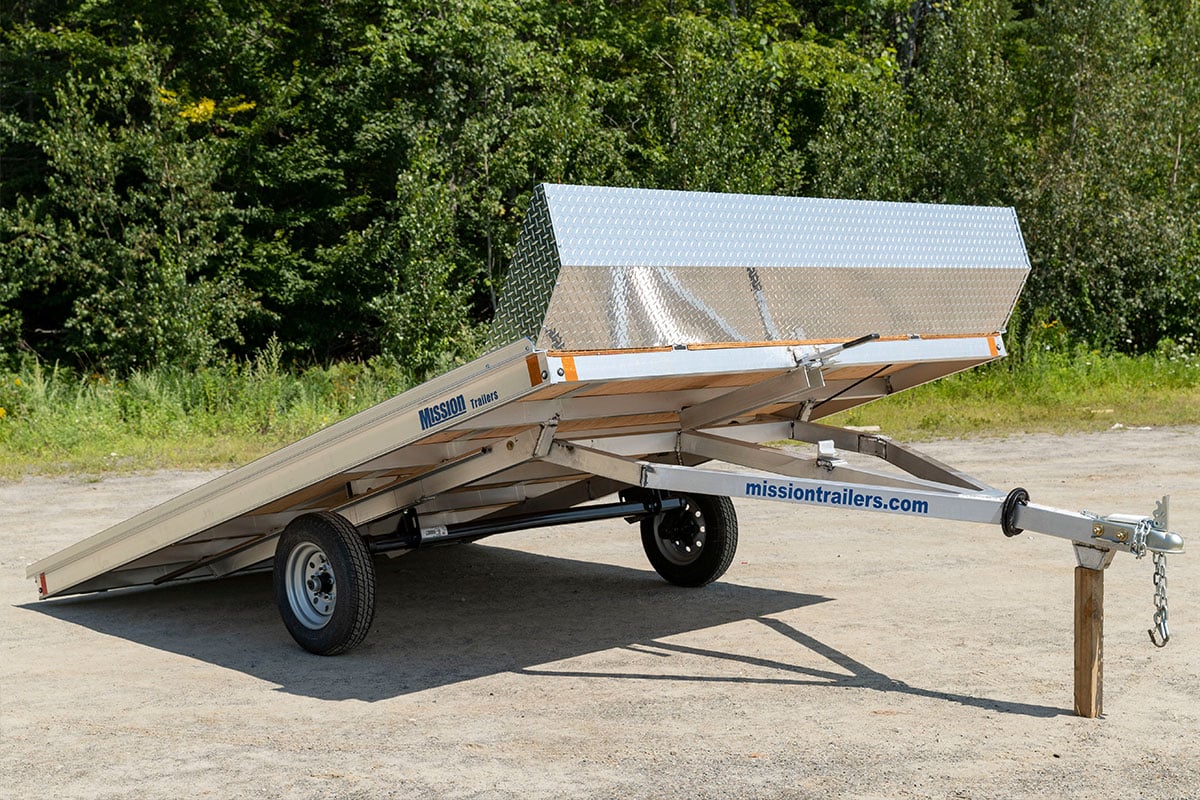 Tilting deck two-place open snowmobile trailer by ALCOM