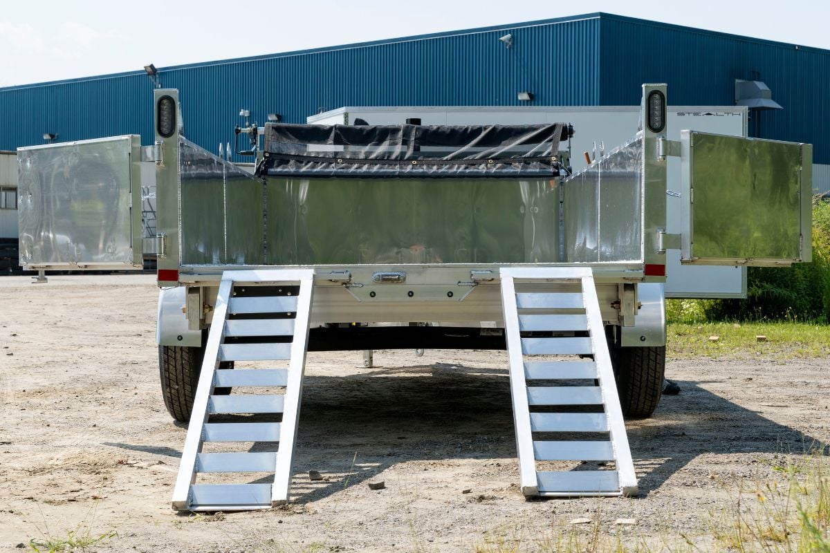 Commercial aluminum dump trailer ramps with barn doors open