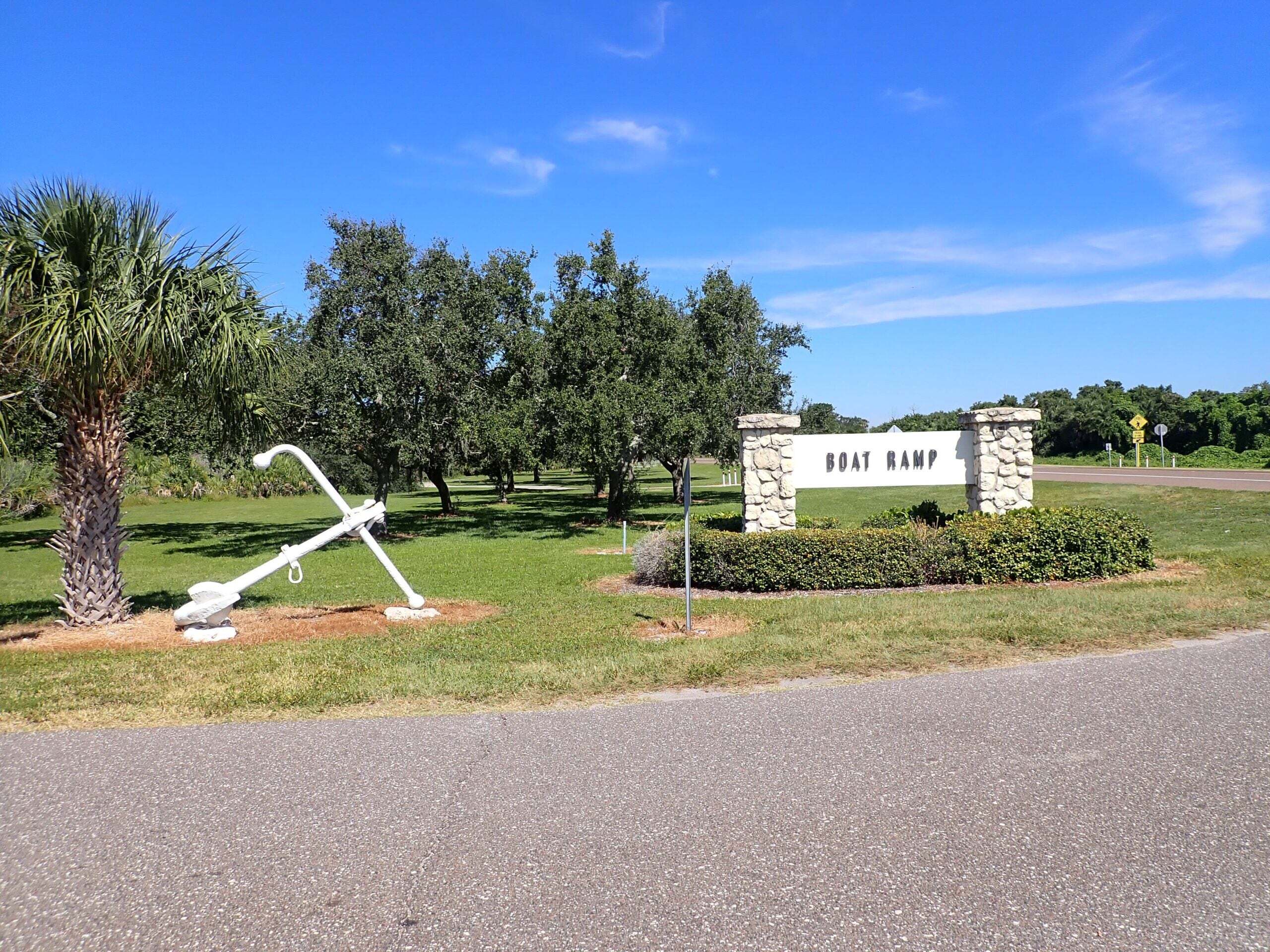 Fort DeSoto boat ramp sign and anchor on a sunny day; PC pinellas.gov