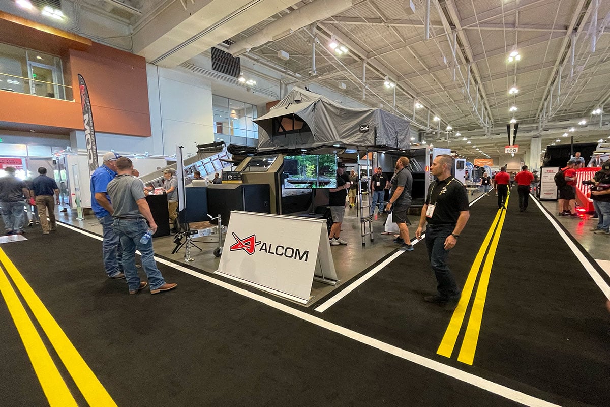 Visitors stopping by the ALCOM exhibition at the NATDA Trailer Show