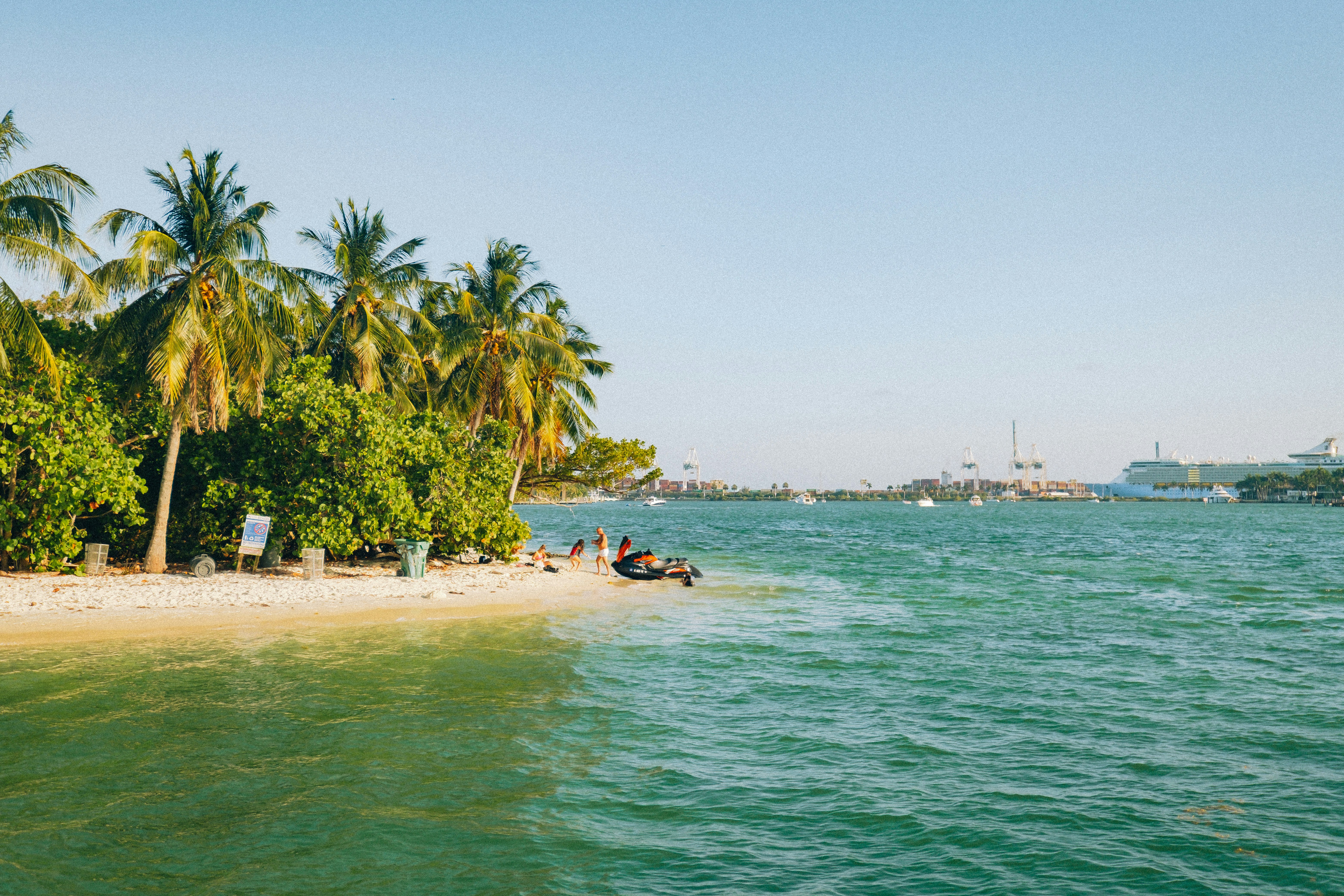Jet ski riders on a small island beach in Miami FL - PC Brian-Lundquist