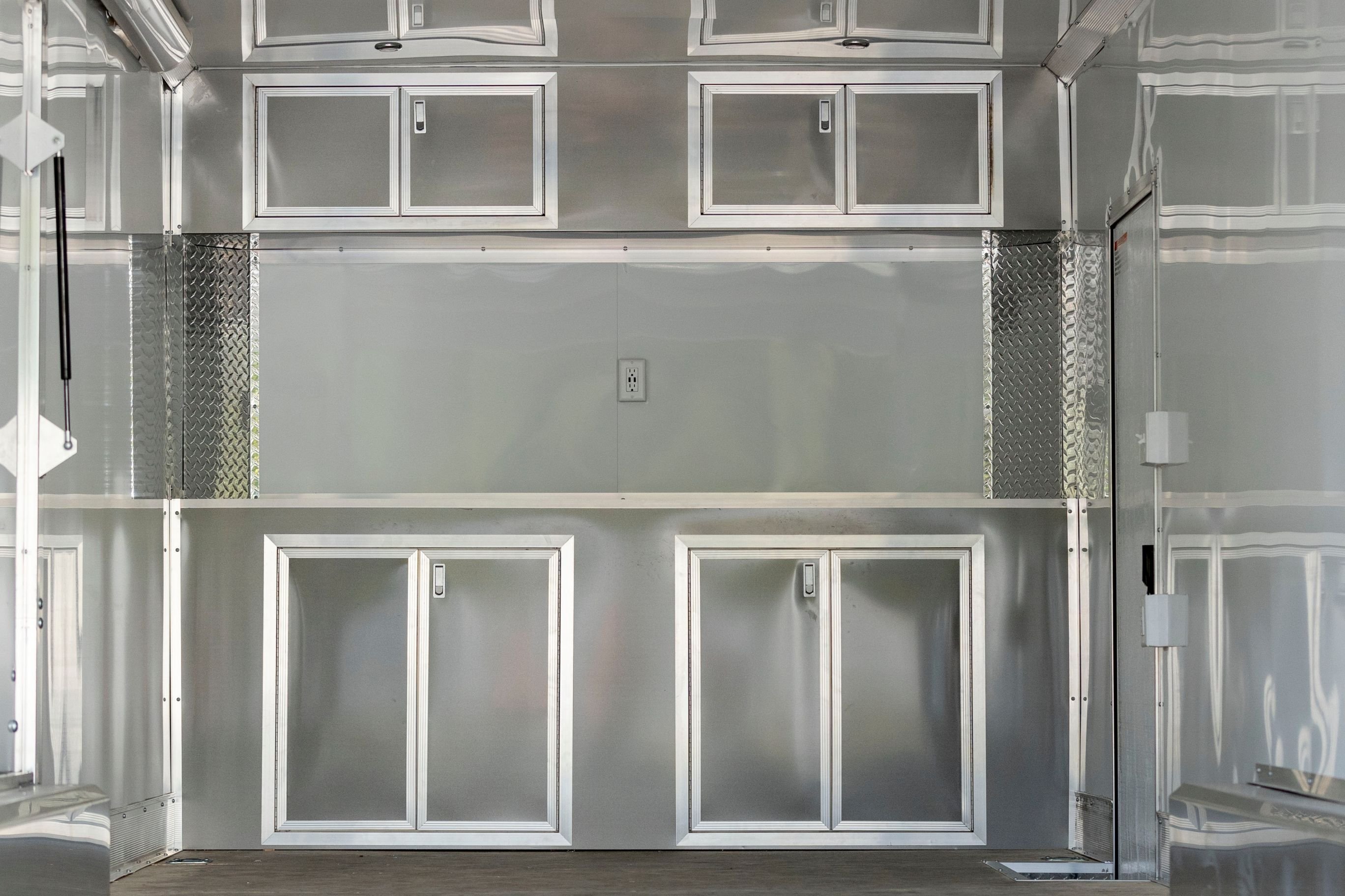 Interior cabinets shown with upper and lower option and wall outlets