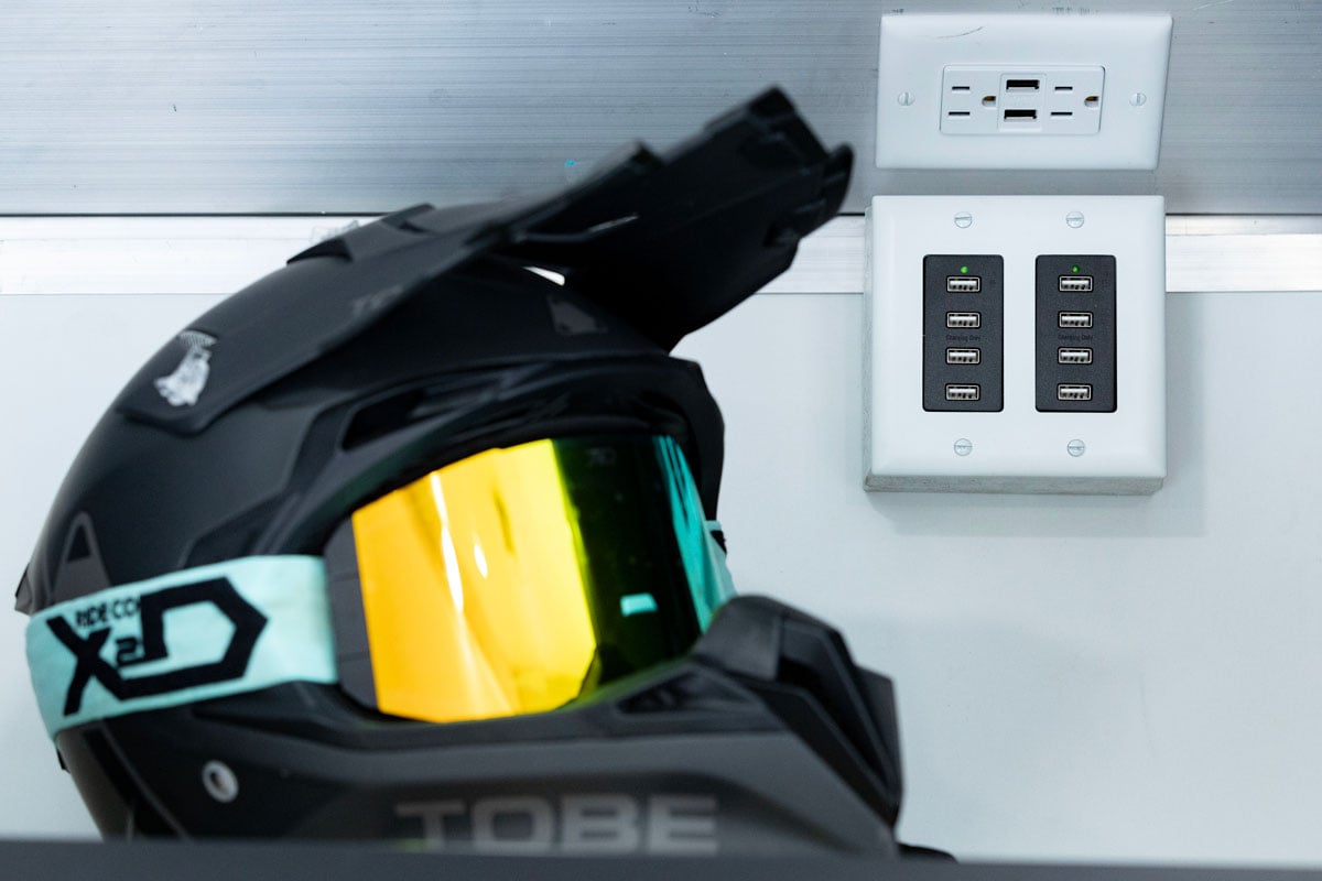 Snowmobile helmet, wall outlets and USB ports in an enclosed Elevation trailer
