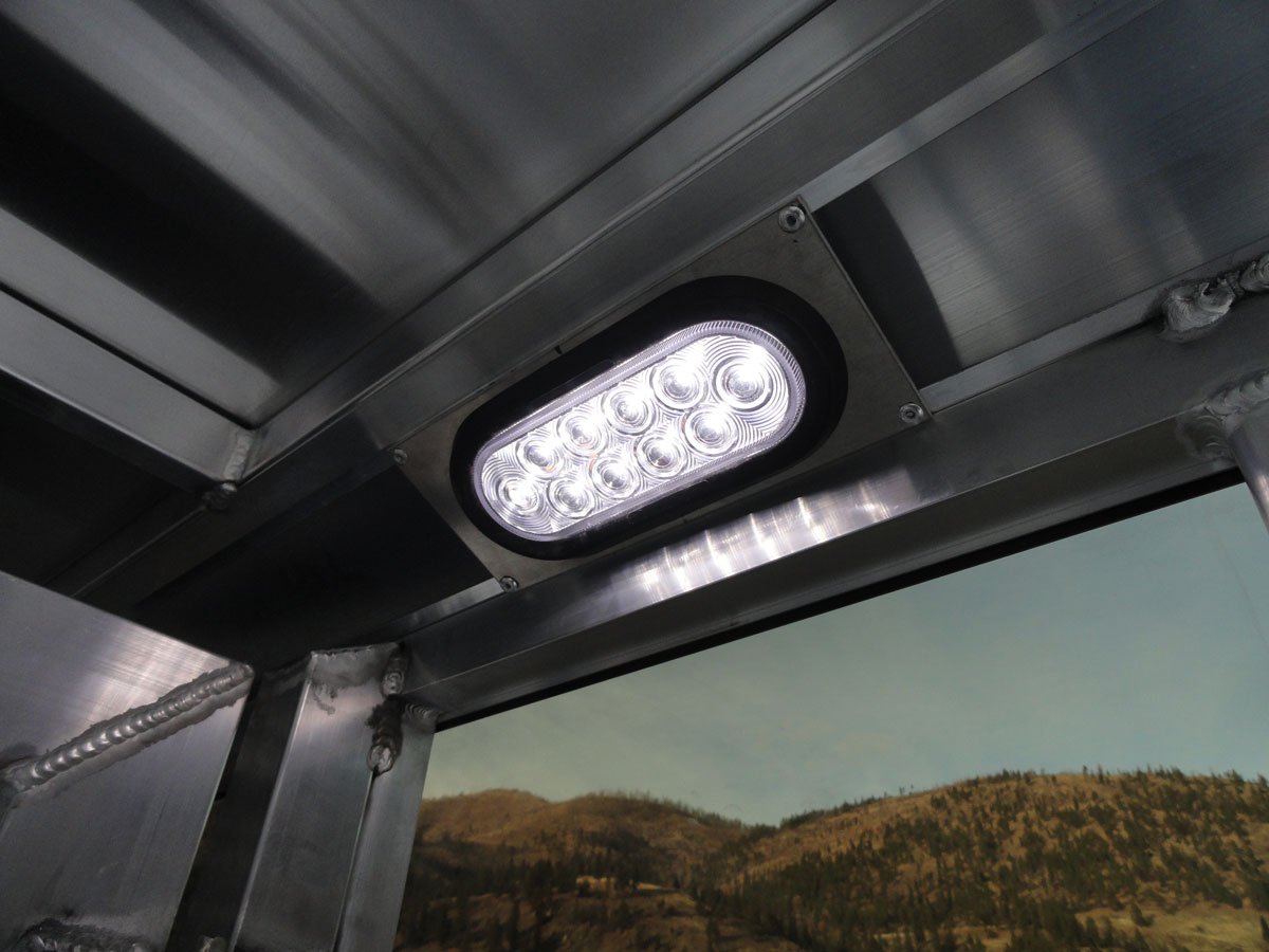 LED stock area dome light inside a Frontier aluminum livestock trailer