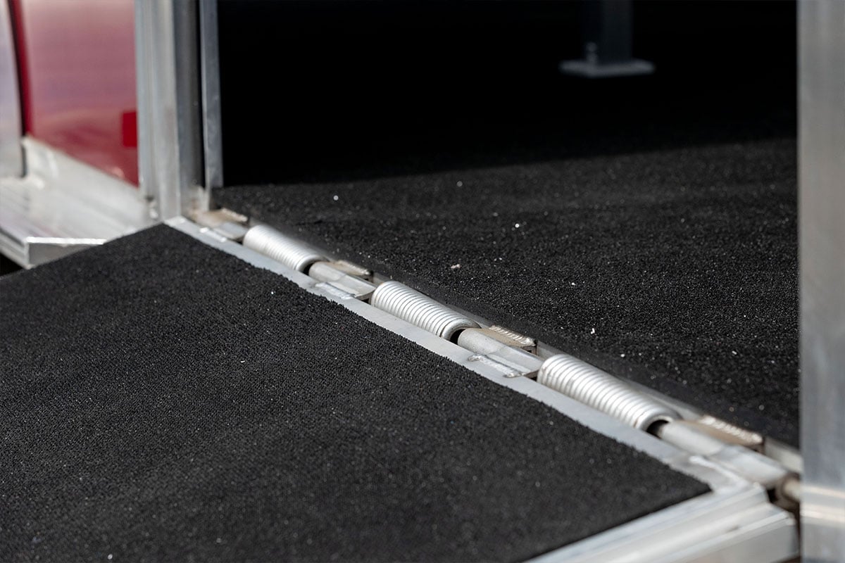 Rubber flooring inside the stalls and on the Frontier aluminum trailer's ramp 