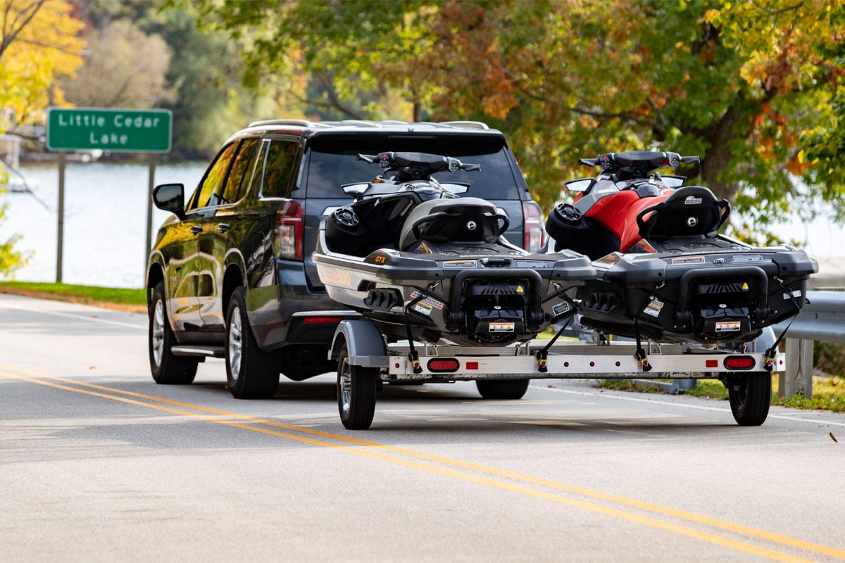 Triton ELITE series aluminum personal watercraft trailer hauling two jetskis 