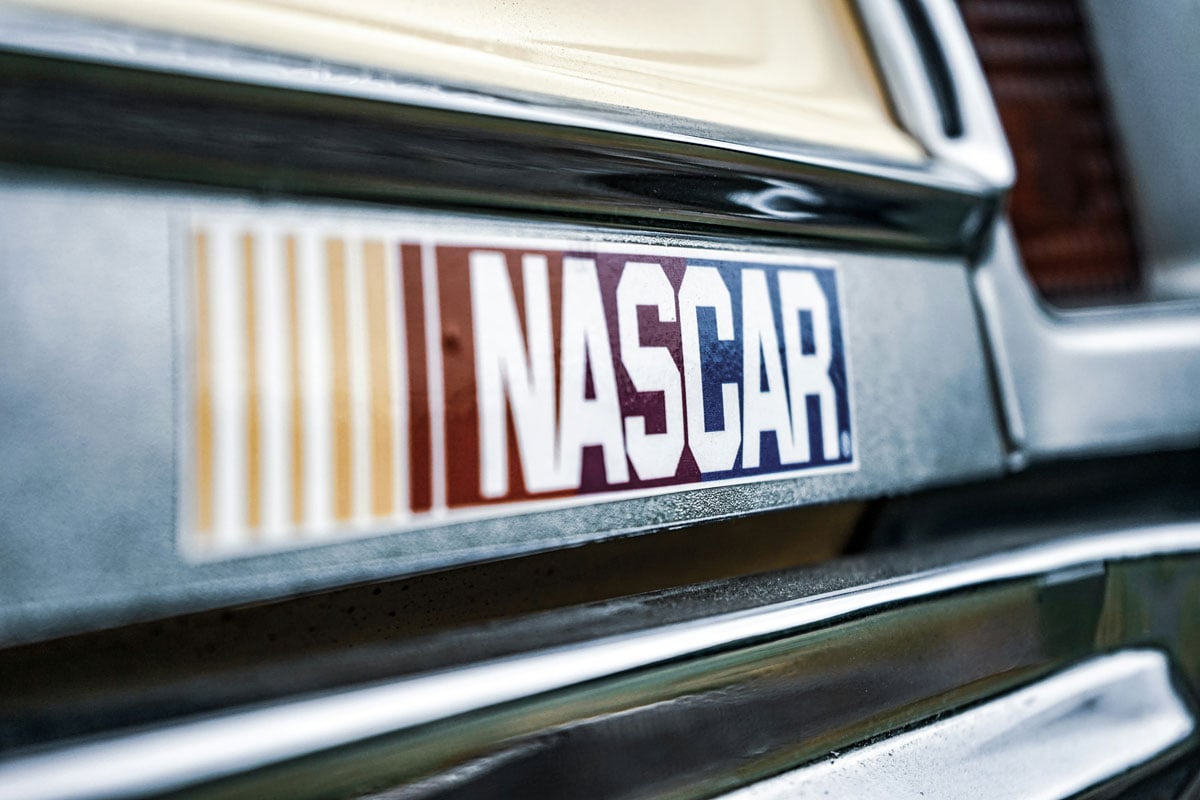 A NASCAR logo close-up on a racecar