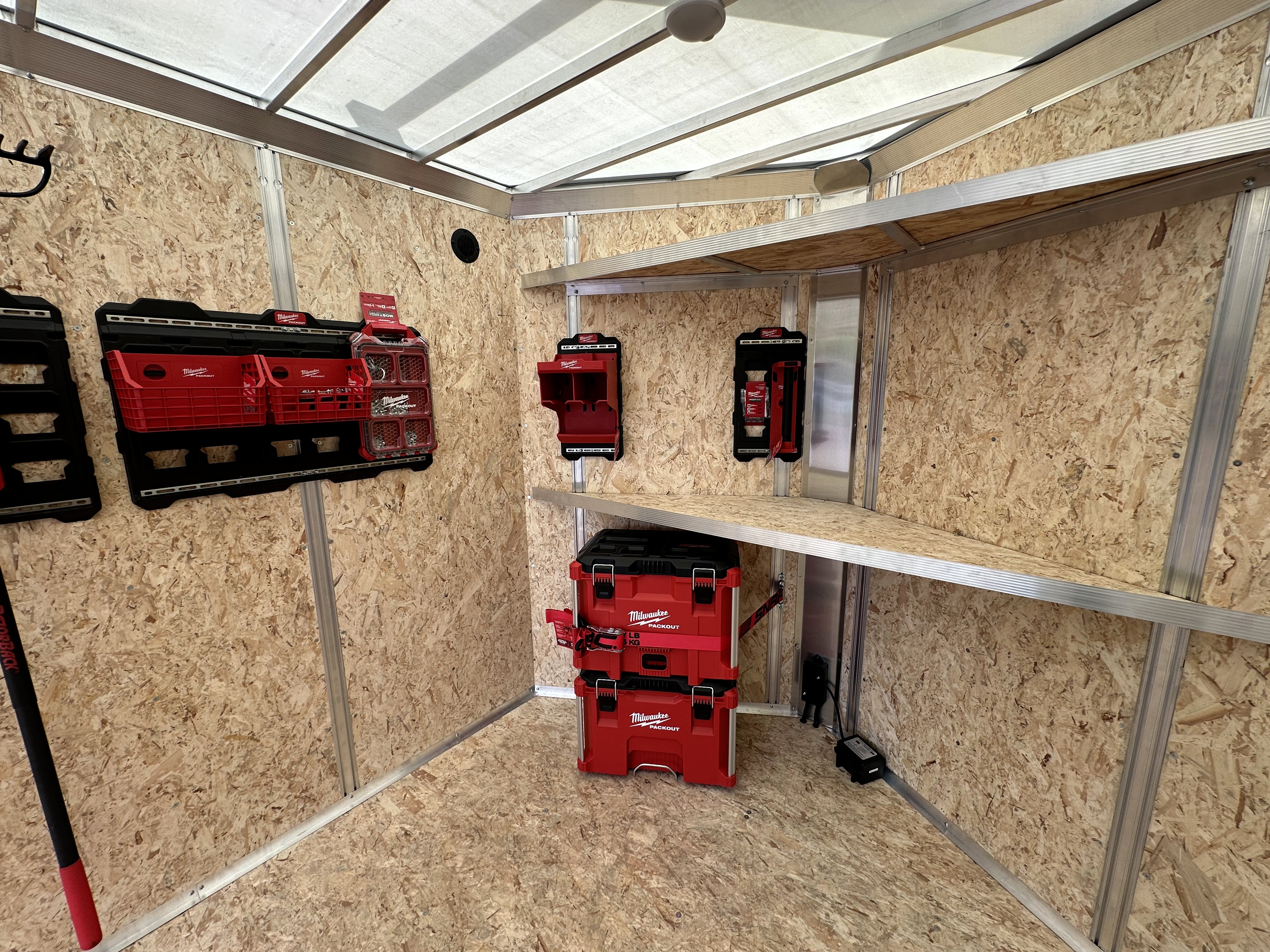 Integrated wall studs inside an enclosed aluminum trailer