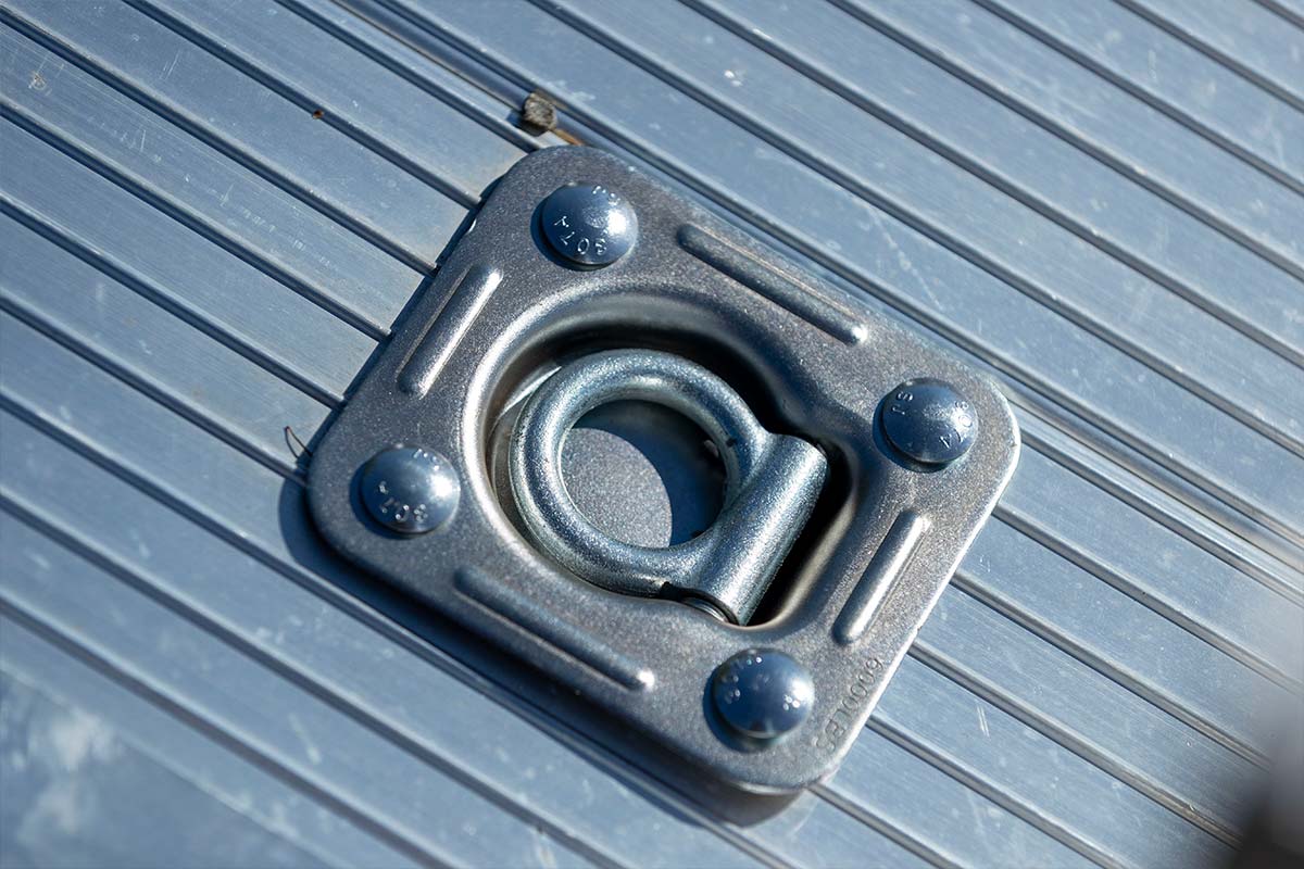 Standard recessed D-ring on an open aluminum utility trailer