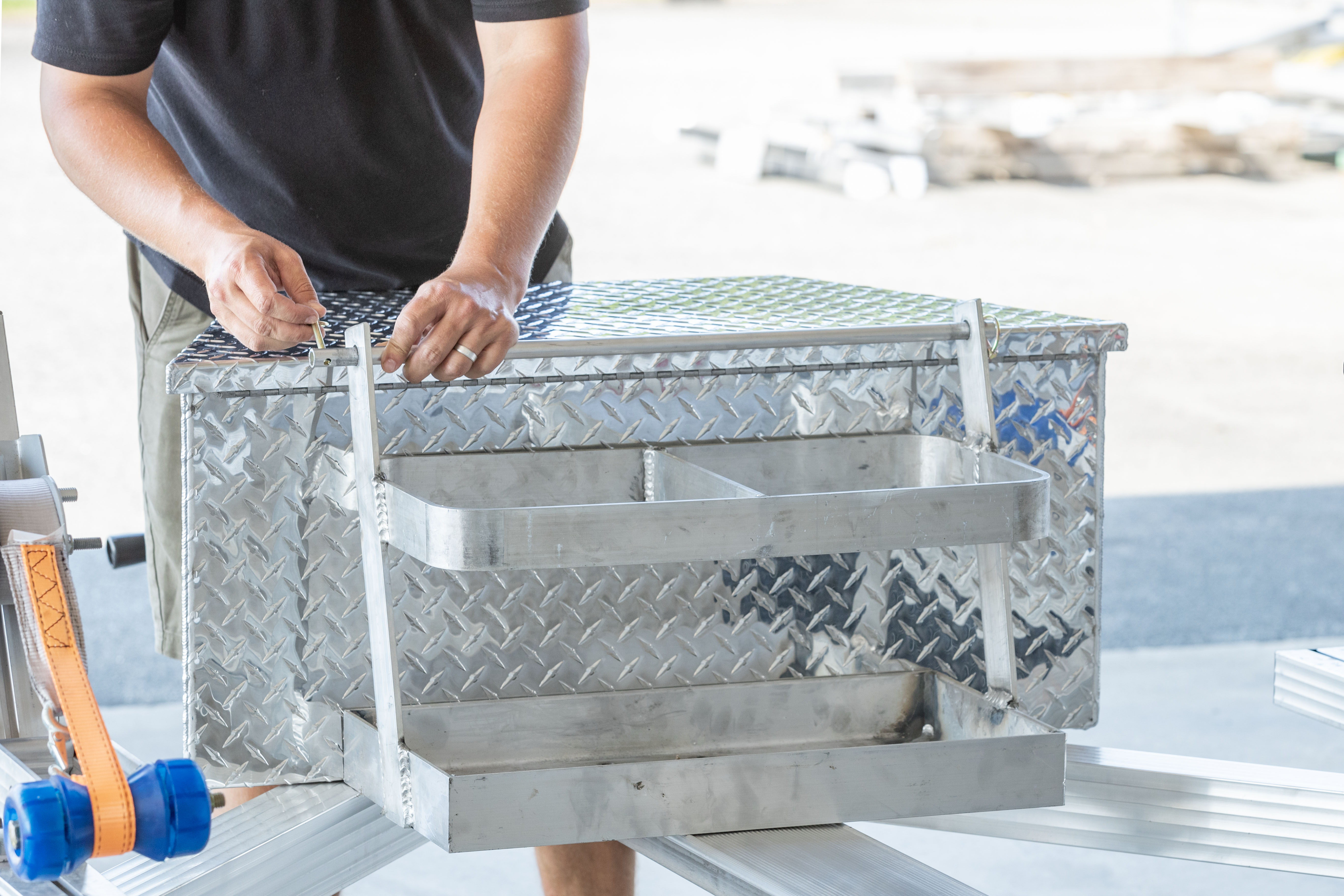 Gas can holder on an all aluminum Triton PWC trailer