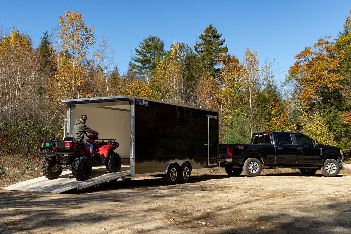 Loading up an ALCOM aluminum ATV/UTV trailer during a New England fall day.